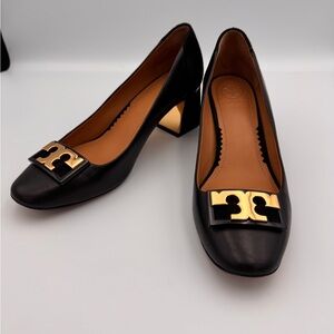 Tory Burch Leather pumps size 6 with gold detail on heal and logo on toe.